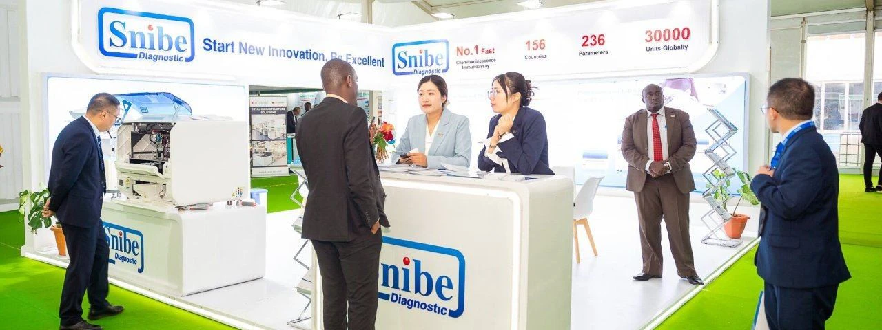 Exhibitors and attendees at a Snibe Diagnostic stand at World Health Expo Nairobi
